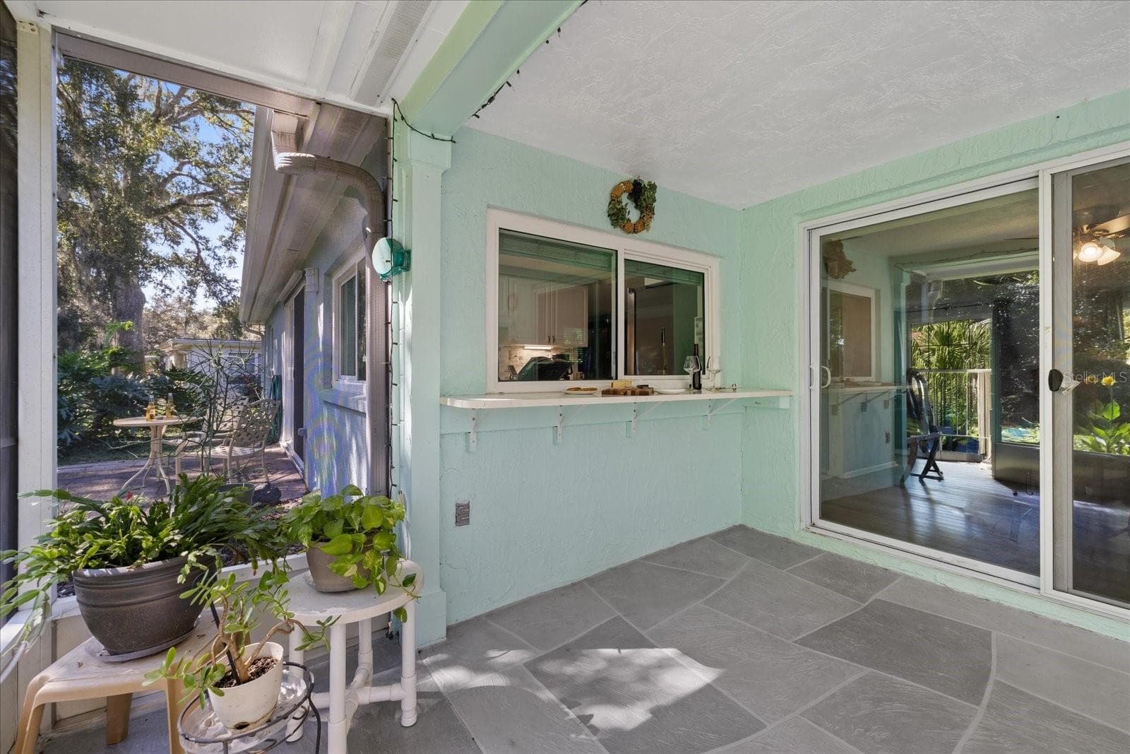 pass through window into Kitchen - 8710 ARROWHEAD DR, HUDSON