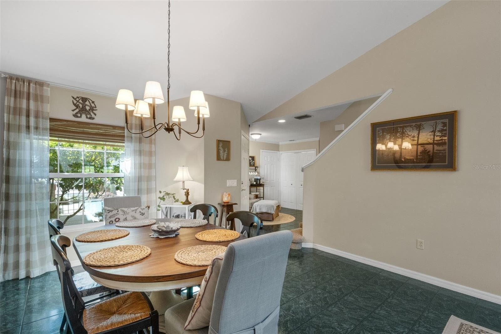 Beautiful large windows and French door allow in golden natural light. - 1113 WATERFALL LN, LAKELAND