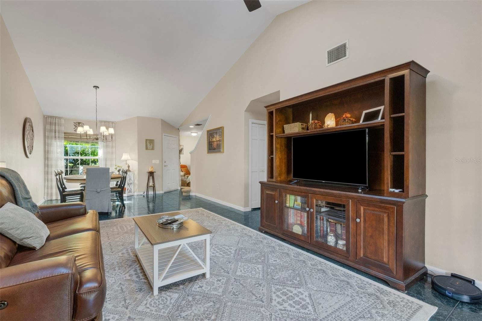 Volume ceilings draw the eye upward and make the space see even larger. - 1113 WATERFALL LN, LAKELAND