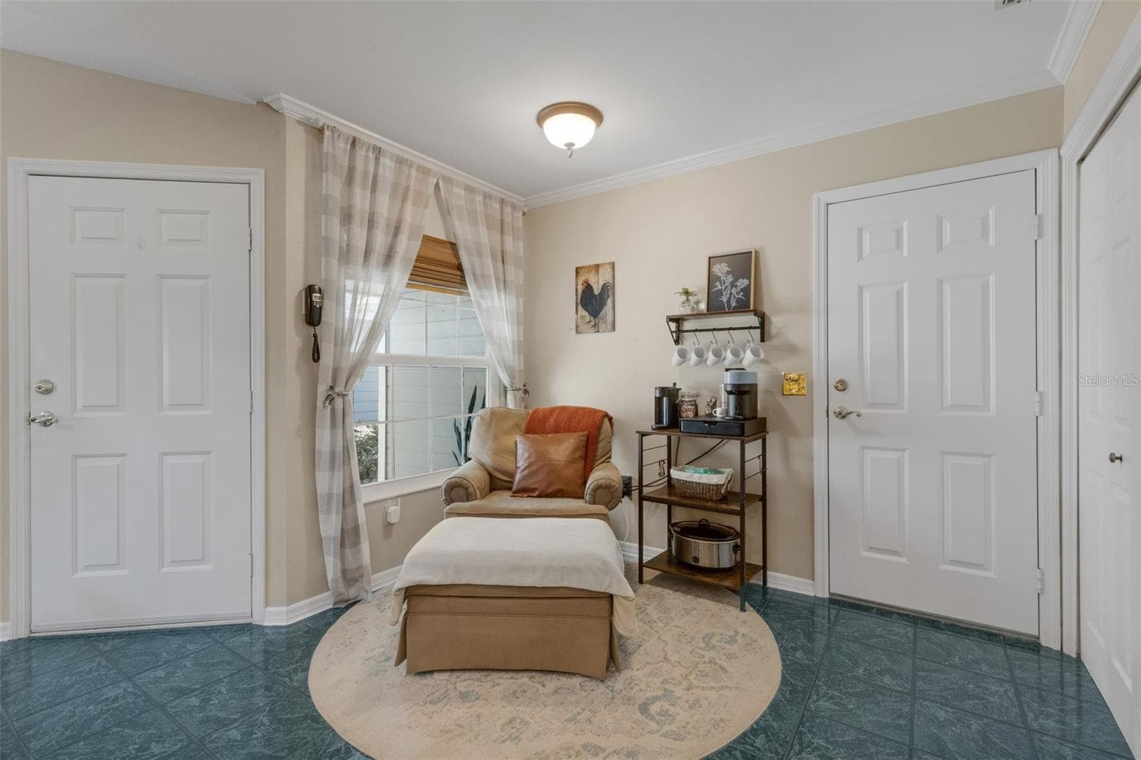 The kitchen dining nook is currently utilized as a "relax with a cup of coffee" spot. - 1113 WATERFALL LN, LAKELAND
