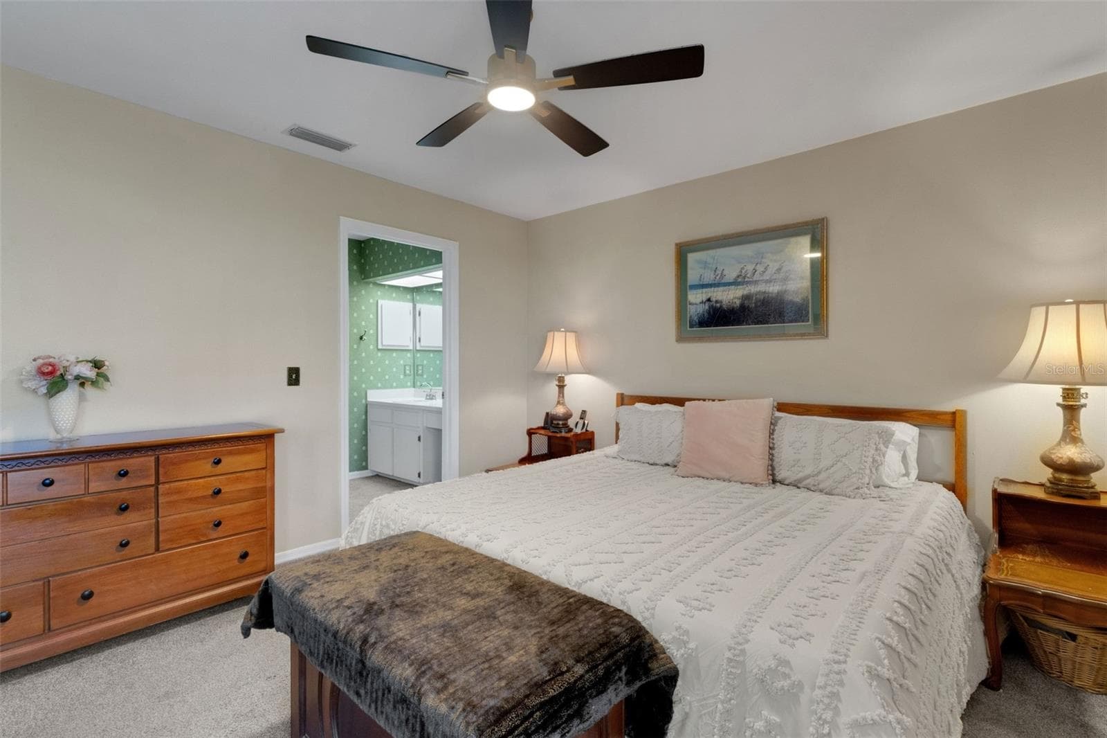 with its ensuite bathroom and walk-in closet. - 1113 WATERFALL LN, LAKELAND
