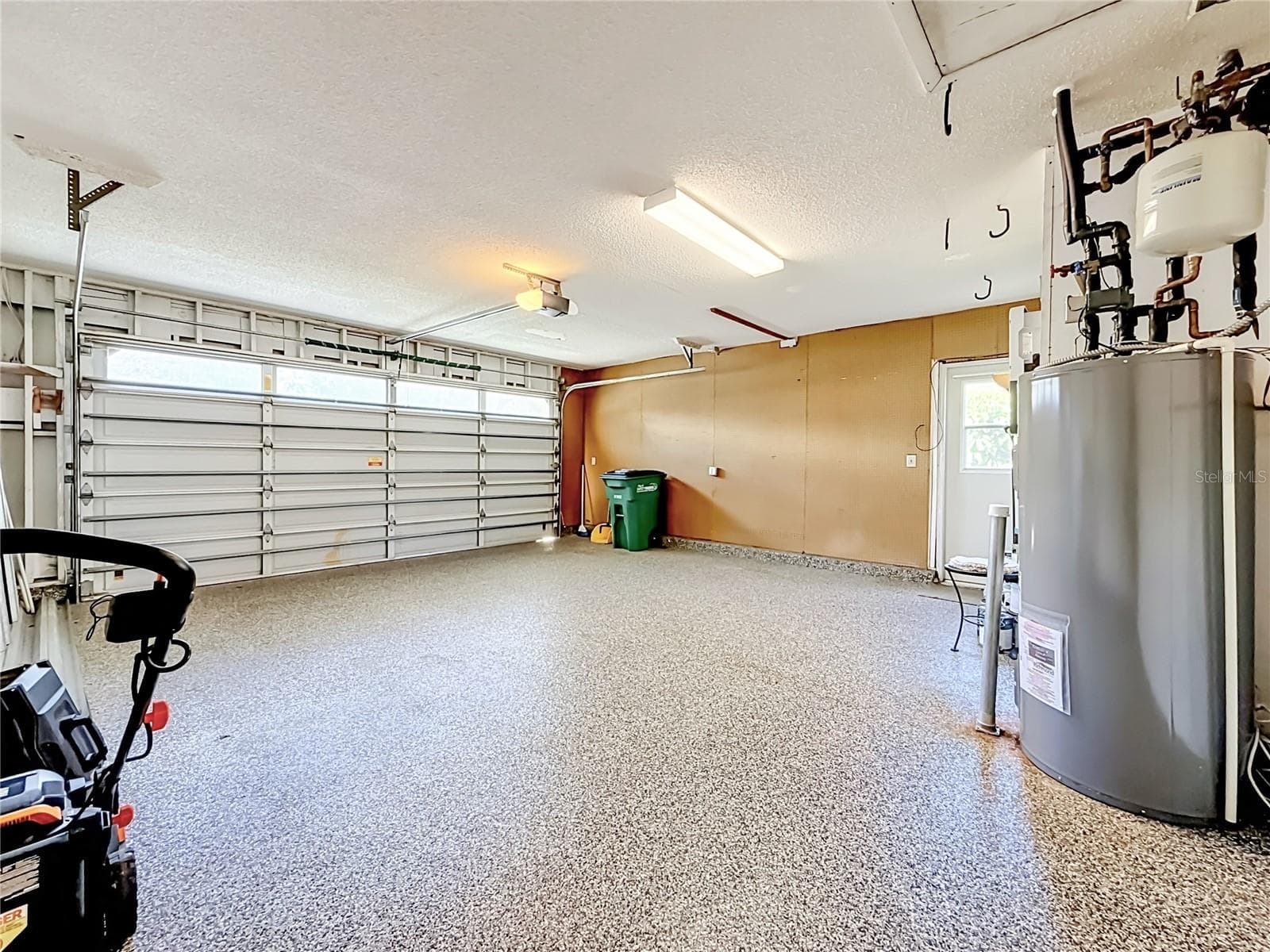Newer epoxy floor & water heater - 3120 SWAN LN, SAFETY HARBOR