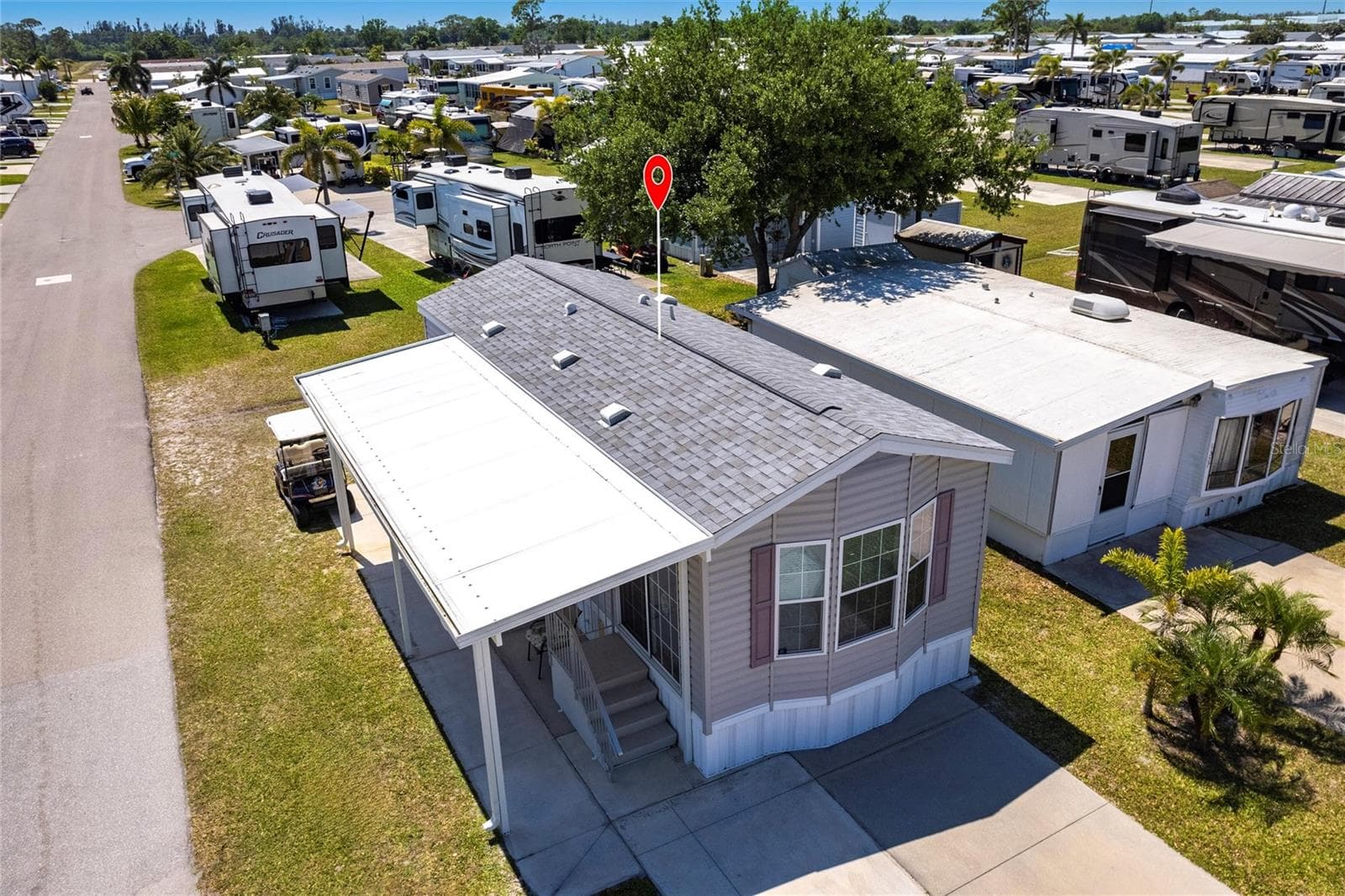 Aerial view of home and new shingle roof - 1329 TROUT, PUNTA GORDA