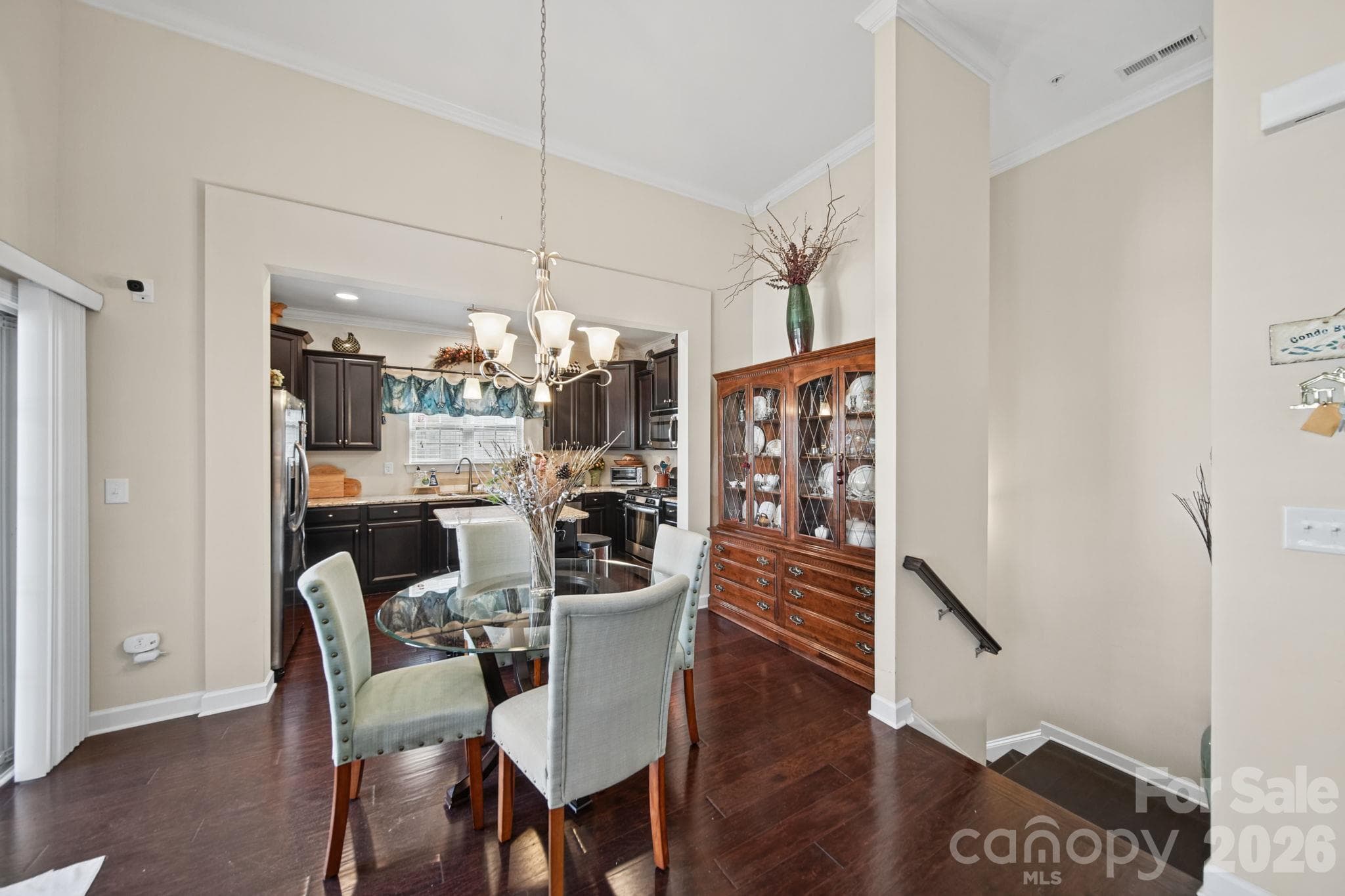 View to stairway downstairs towards entry and garage - 11621 Brachetto Place, Charlotte