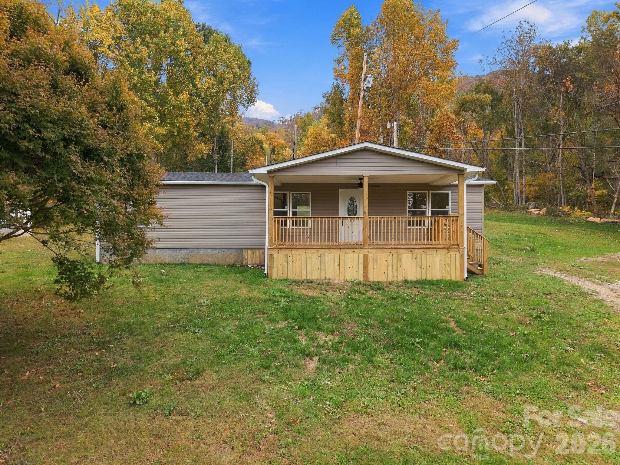 Single Family Residence at 1004 Pine Root Branch Road, Bakersville, photo 7 of 45