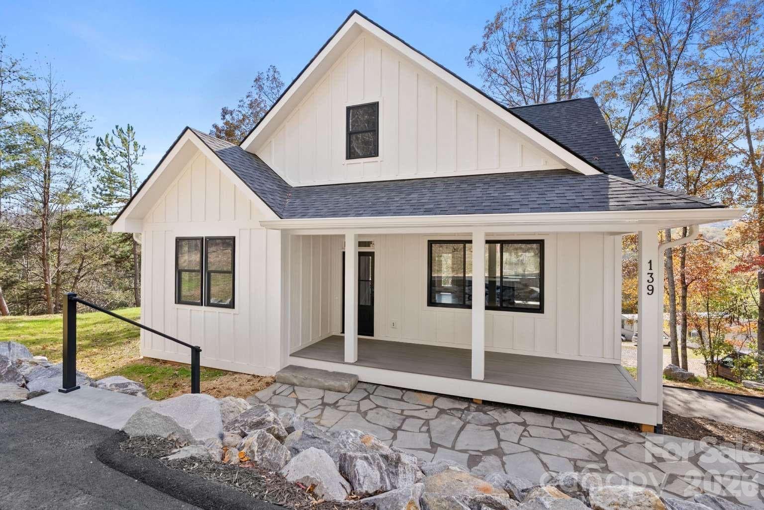 Single Family Residence at 139 Courtney Lane, Candler, photo 4 of 48