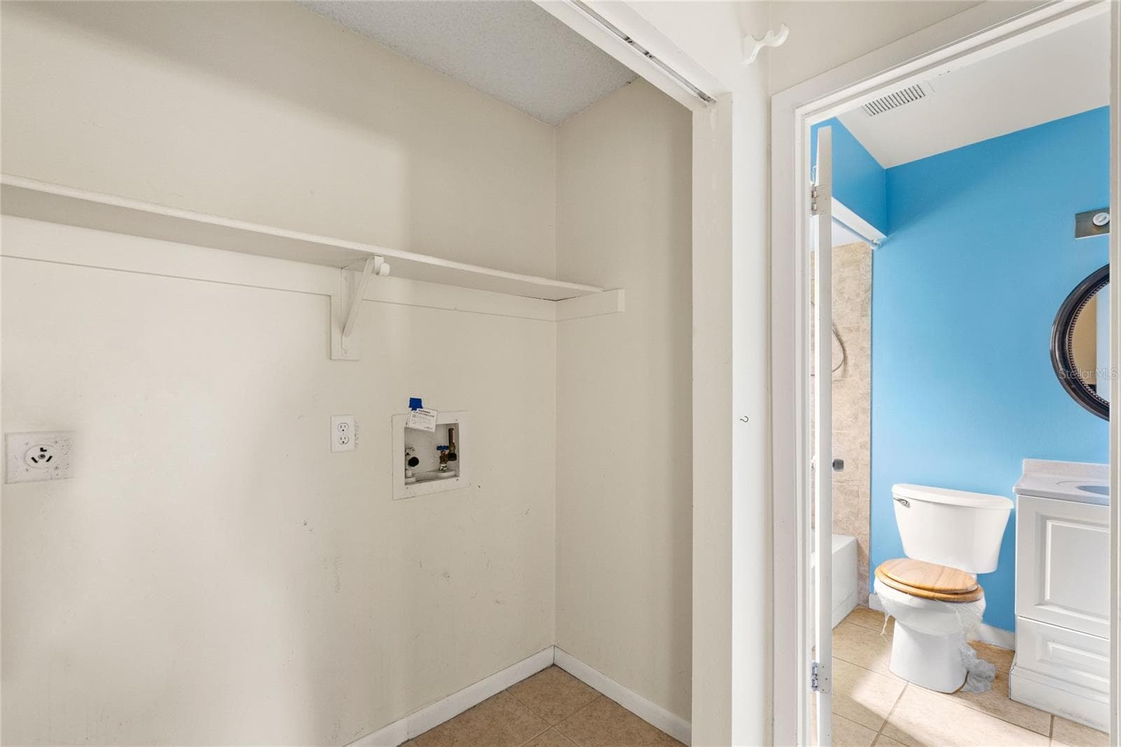 Laundry area - 1273 GLADSTONE DR, DELTONA