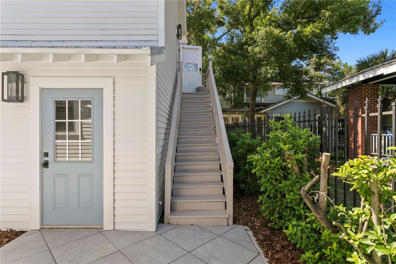 Door to the 2 car garage, Stairs lead to the Guest House - 913 S BRUCE ST, TAMPA