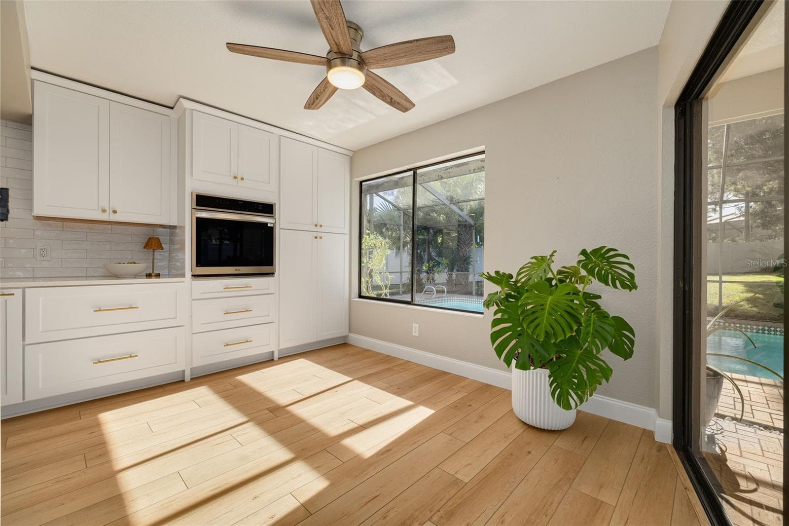 PART OF THE KITCHEN - 1496 TREETOP DR, PALM HARBOR