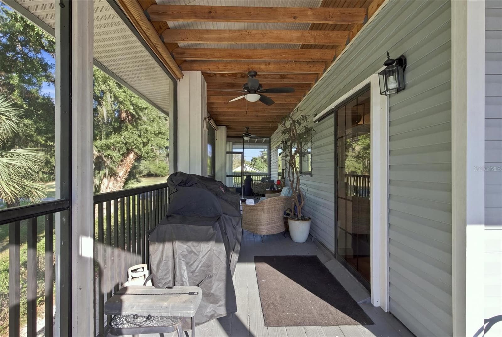Main Floor Wrap Around Porch - 14317 GUAVA ST, HUDSON