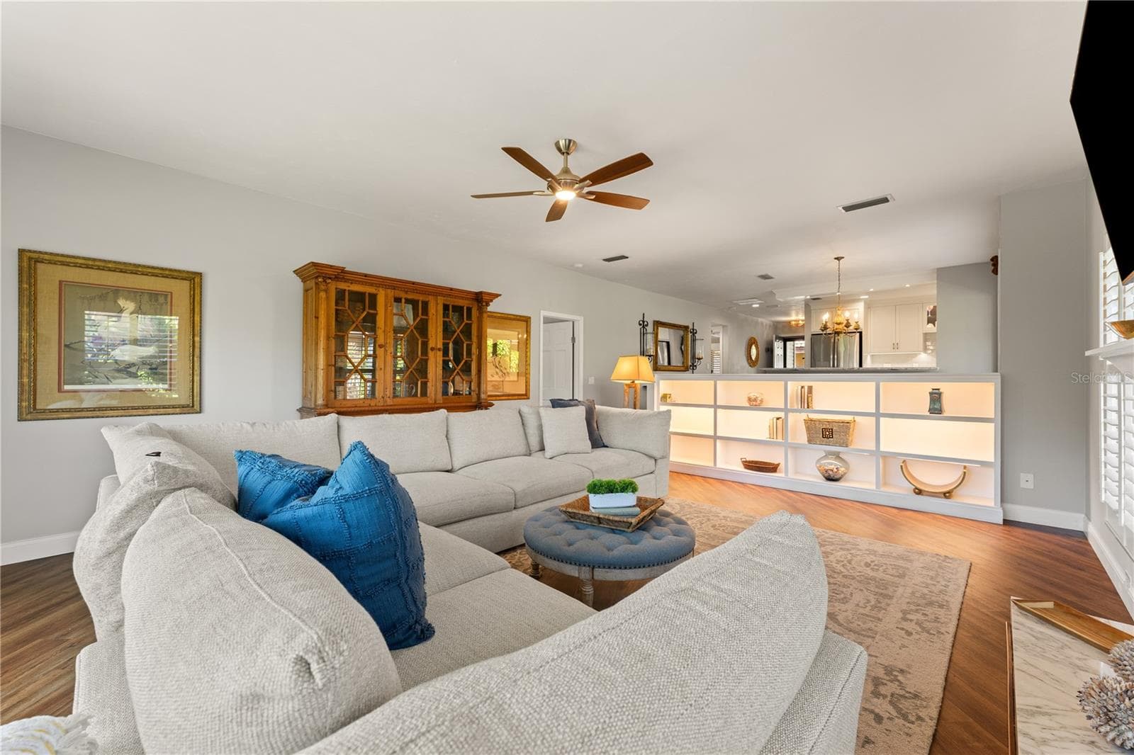 Seamless transition from living area to formal dining space. - 1720 KESTRAL PARK WAY S #49, SARASOTA