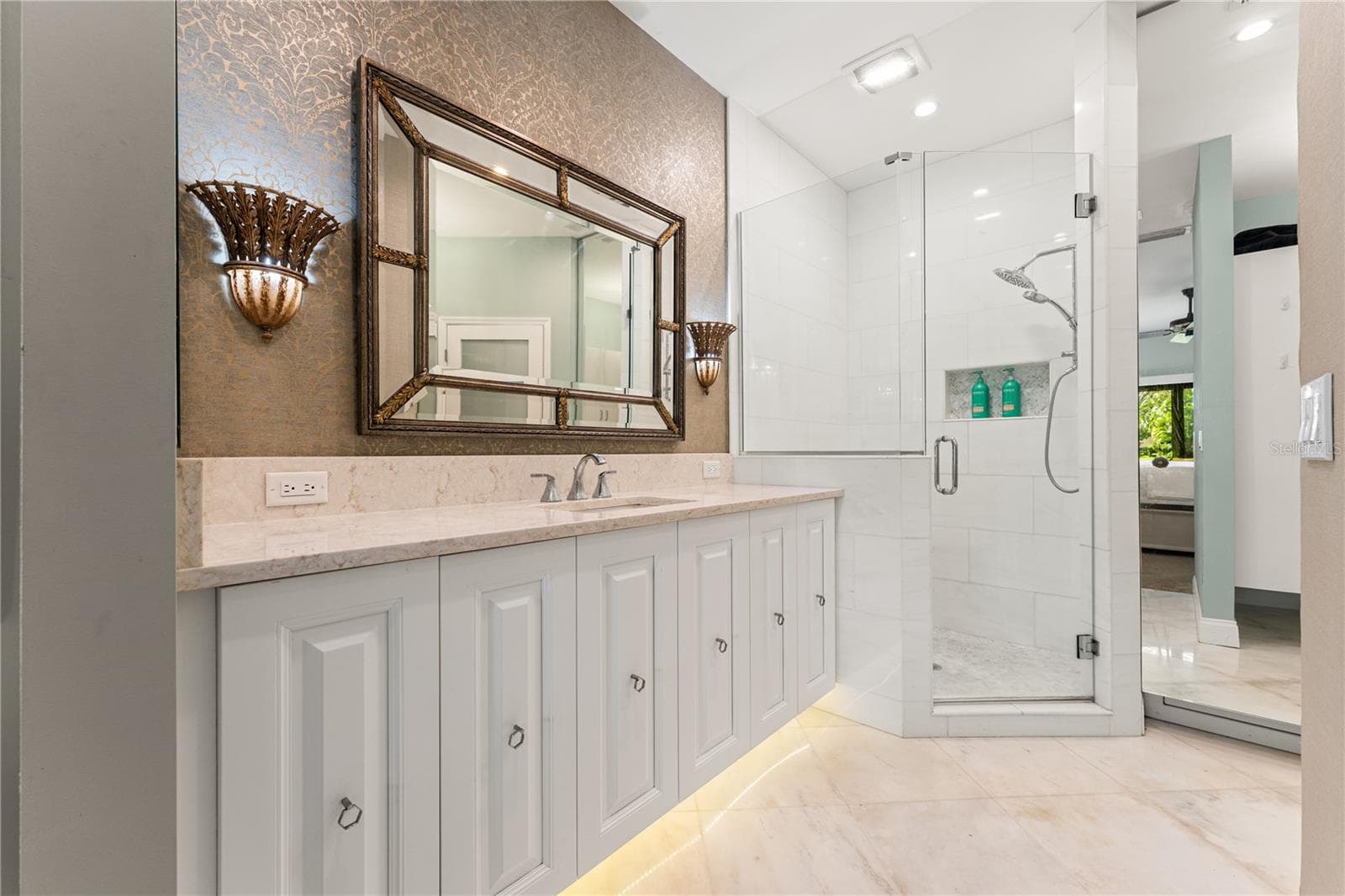 Dual sink vanity finished with solid surface stone counters. - 1720 KESTRAL PARK WAY S #49, SARASOTA