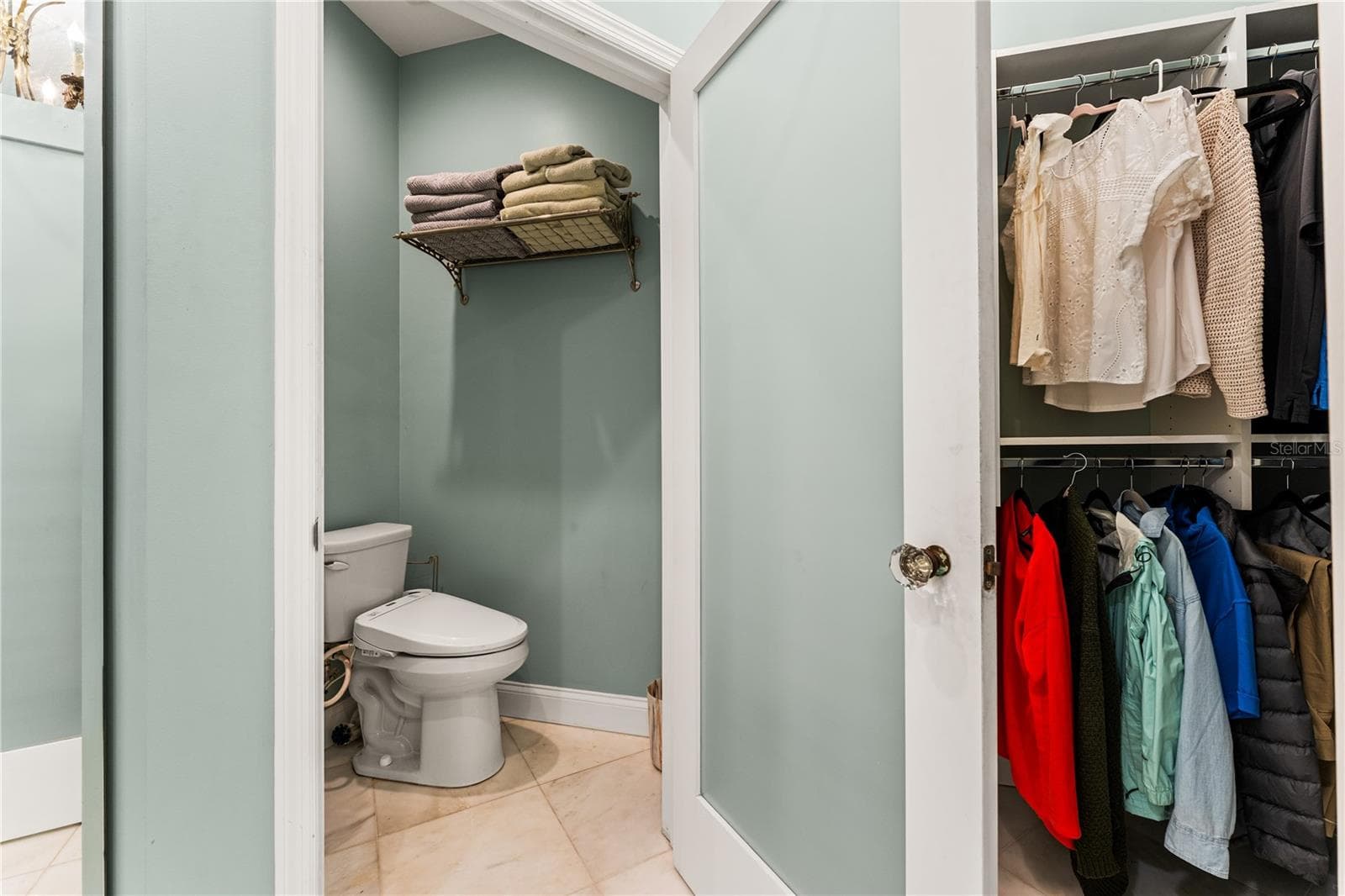 Private water closet located within the primary en-suite. - 1720 KESTRAL PARK WAY S #49, SARASOTA