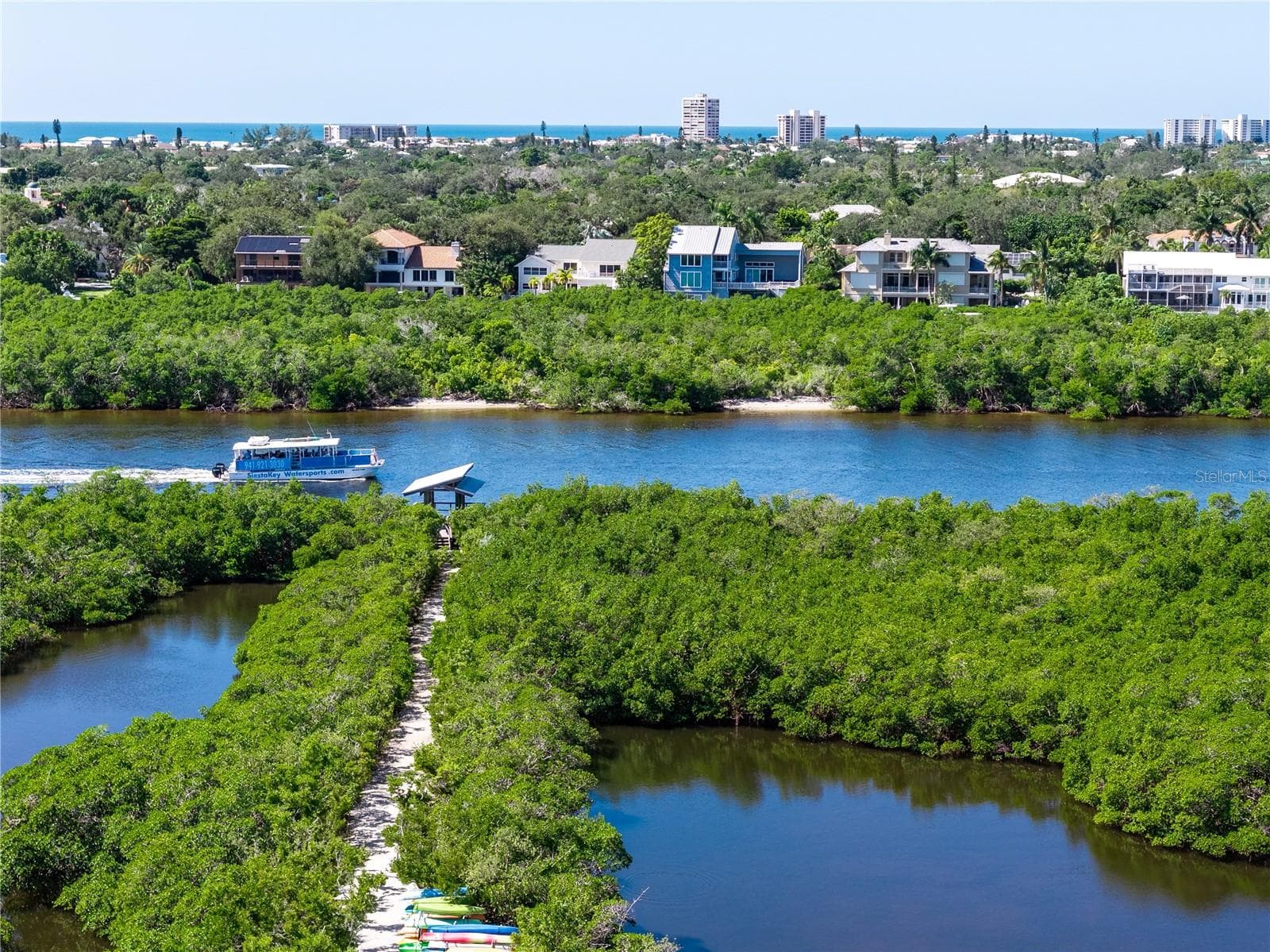 Aerial perspective of Landing's protected mangrove preserves, trails, and coastal waterways. - 1720 KESTRAL PARK WAY S #49, SARASOTA