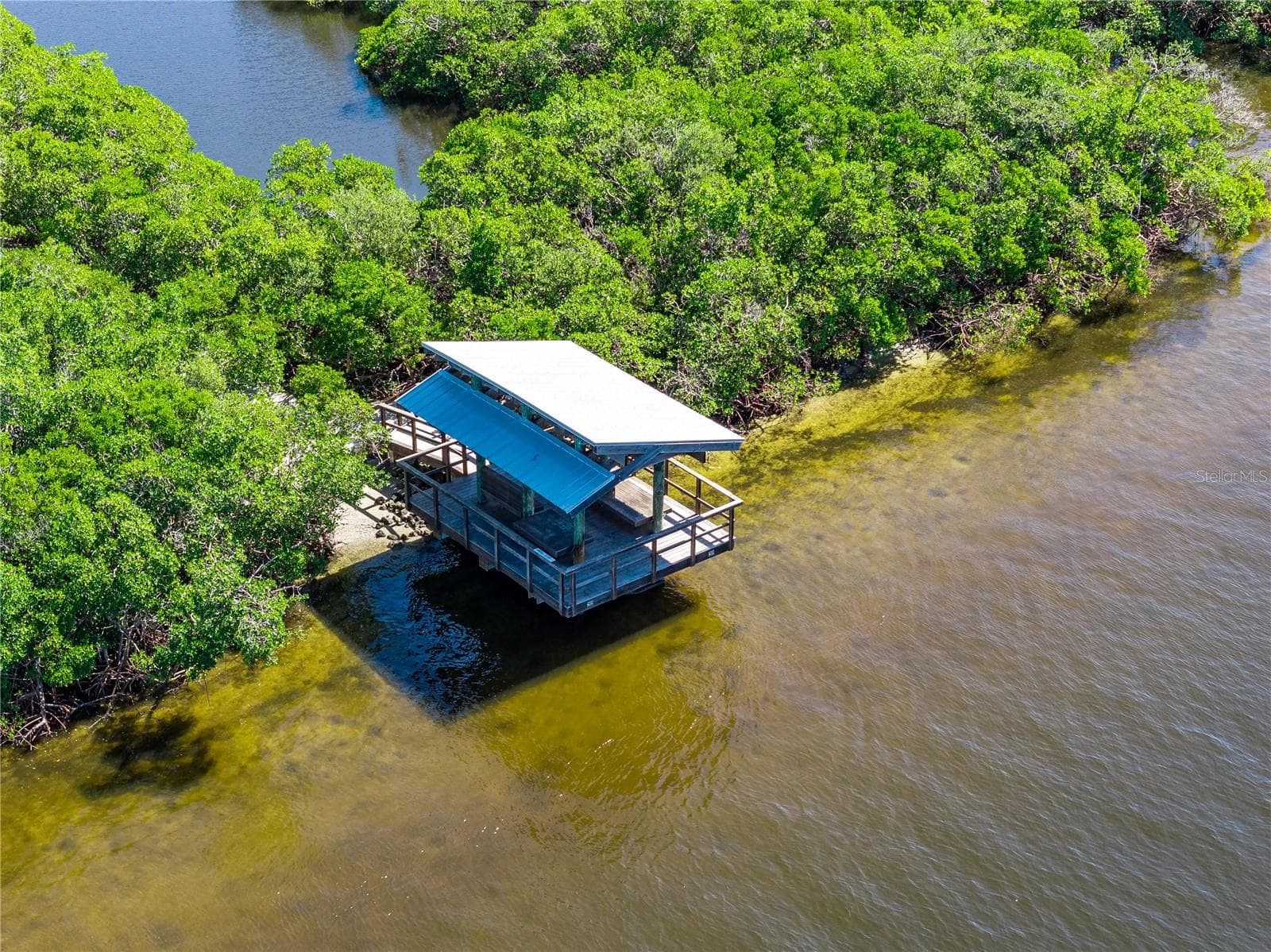Waterfront gazebo positioned along the community nature trail system. - 1720 KESTRAL PARK WAY S #49, SARASOTA