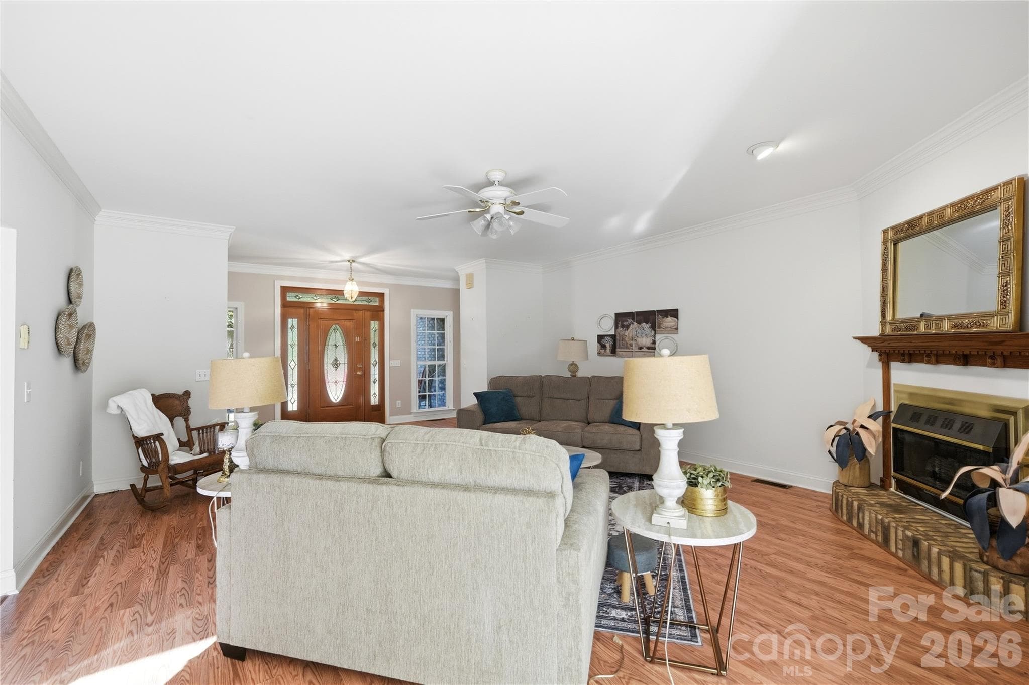 Mantle and fireplace ready for holiday decorations and plenty of space for exchanging and opening gifts or simply entertaining in the fall....or really any season.  Use your imagination to decorate this space to meet your needs. - 244 Ruth Boulevard, Peachland