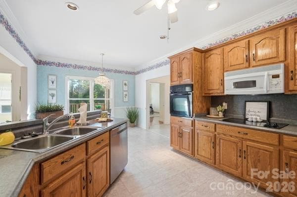 Enjoy easy access with just a few steps.  Here you see more of the quality of the cabinetry, flat top range and built in appliances, leading to breakfast area and primary bedroom in this home with split floor plan.  Around the corner is the door to the 2 car garage. - 244 Ruth Boulevard, Peachland