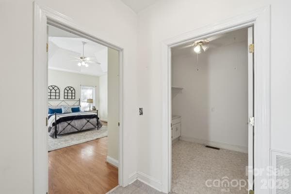 A few steps from the kitchen, you will find the primary bedroom.  This area provides the maximum of relaxation.  Tons of natural light and tray ceiling, beautiful flooring.  Relax and enjoy your own private space. - 244 Ruth Boulevard, Peachland