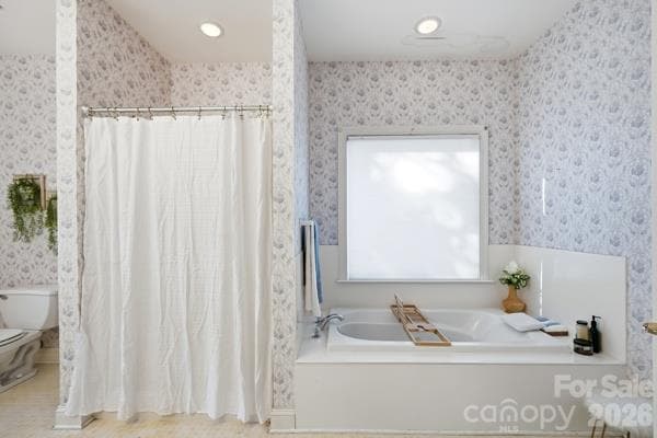 Your choice, soak in your tub, or take a quick shower.  Get ready for your day in your own style and at your own pace.  Always good to have a choice.  From the primary bathroom, enter into the spacious walk in closet. - 244 Ruth Boulevard, Peachland