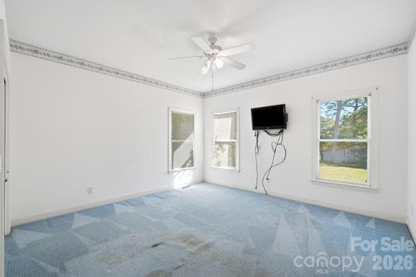 Rear bedroom (#3) had been used as a craft room, some stains on carpet.  Lots of natural light for your favorite projects.  Large secondary bedroom with closet - 244 Ruth Boulevard, Peachland