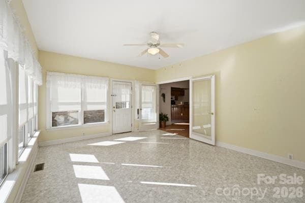 Enormous bright, cheery, sunroom off the living room.  Perfect spot to come out and enjoy your morning coffee in any weather in climate controlled comfort.  Watch the wildlife gather in your back yard. - 244 Ruth Boulevard, Peachland