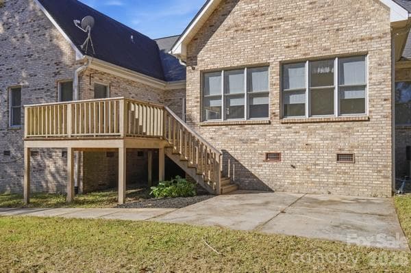 Pictured here you see the sunroom, back deck and patio area.  Walk leads to basement area, 2 car garage and driveway.  Such convenience and privacy.  Possibilities for entertaining are limitless. - 244 Ruth Boulevard, Peachland