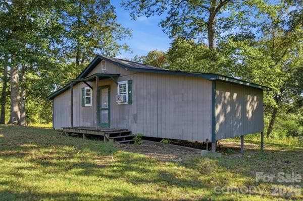 Barn/Workshop/storage.  This feature has electric service for your convenience.  You will see water access at several points across the yard. - 244 Ruth Boulevard, Peachland