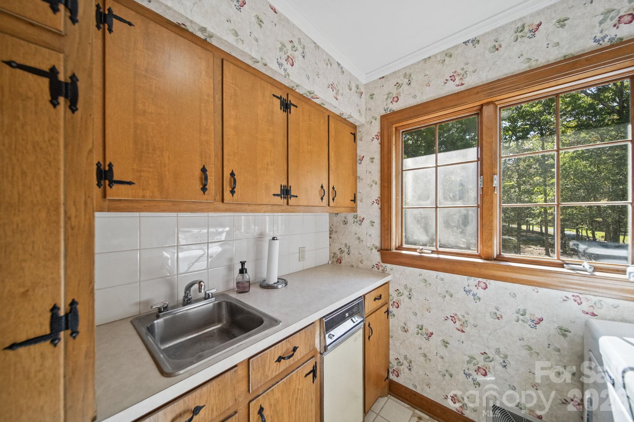 Laundry room with sink and lots of storage space. - 1500 Lee Lynn Road, Albemarle