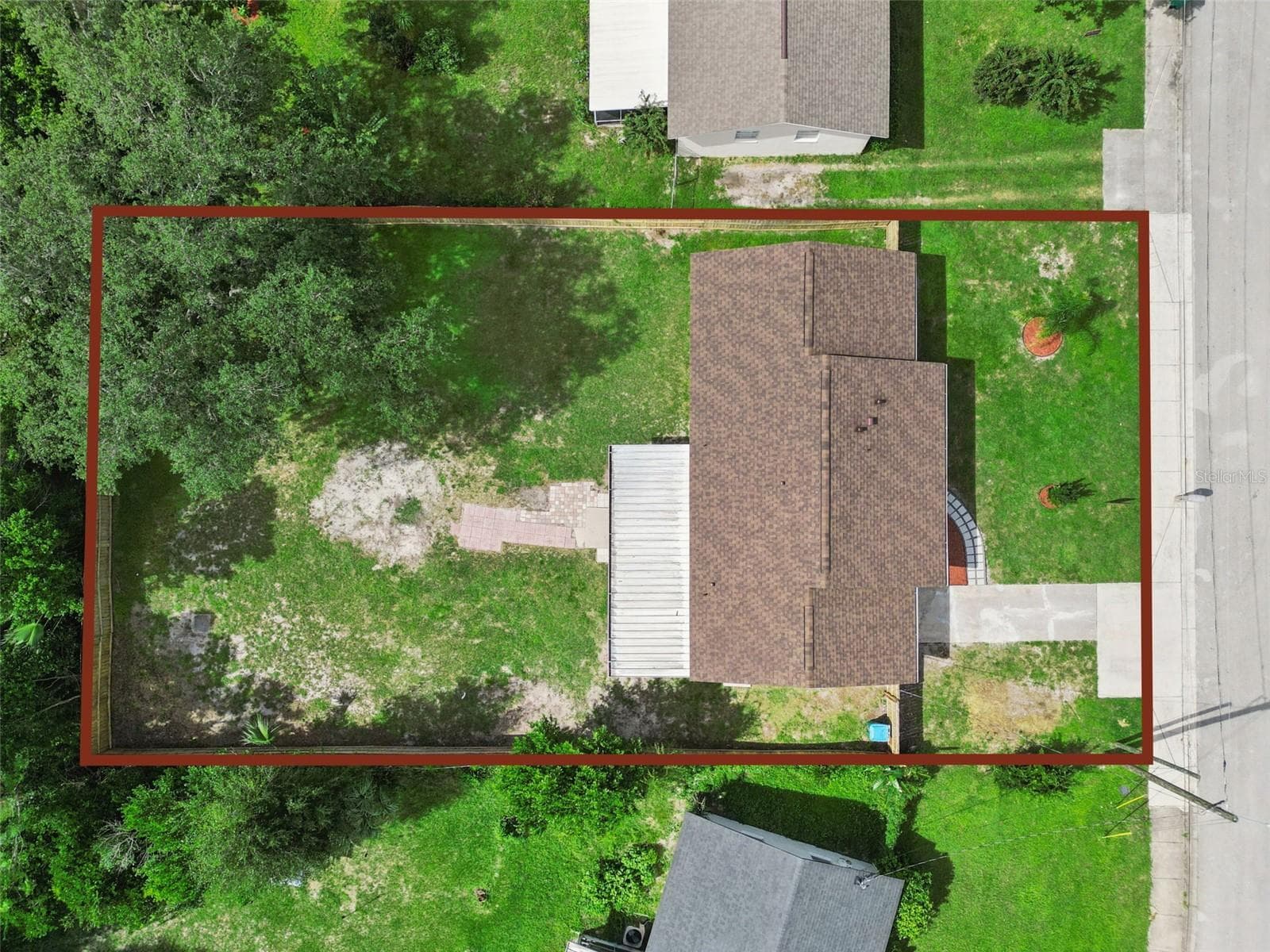 Aerial Lot Boundaries: Overhead aerial view outlining the full property boundary lines and lot dimensions - 720 GEORGIA AVE, LONGWOOD