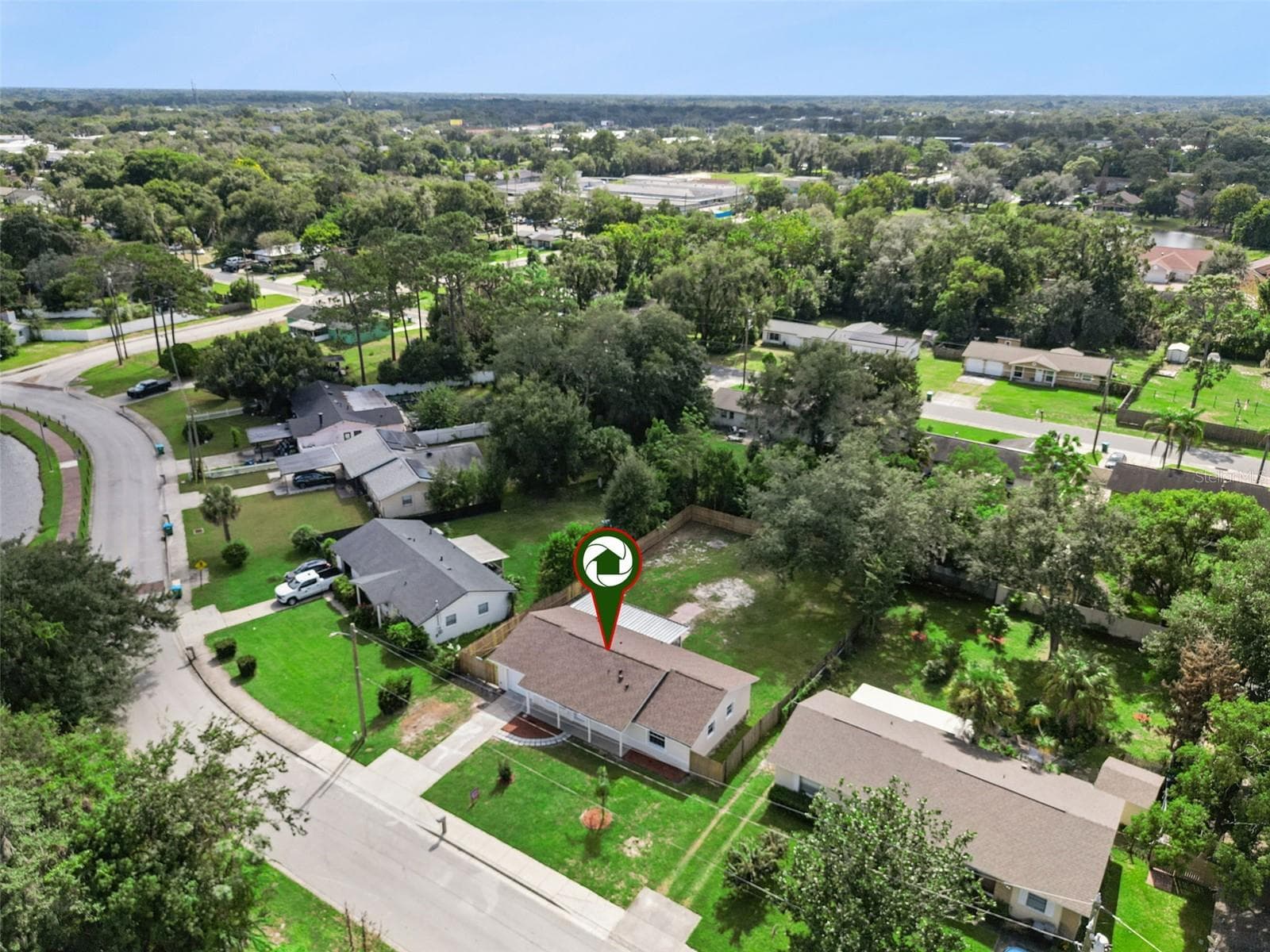 Aerial Location Pin: Neighborhood aerial view featuring a location pin directly identifying the property - 720 GEORGIA AVE, LONGWOOD
