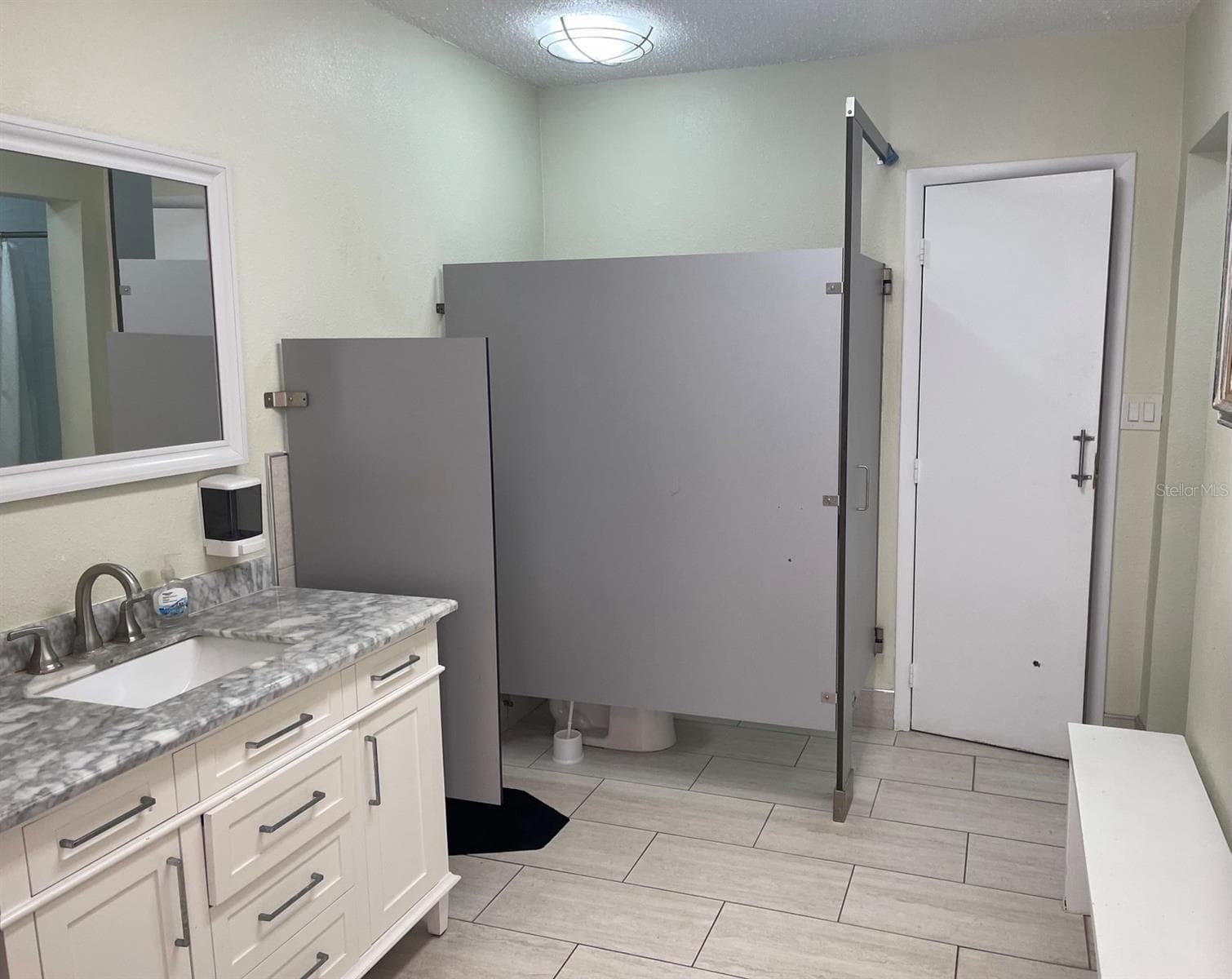 One of two bathrooms by pool with shower and sauna in both - 51 ISLAND WAY #1109, CLEARWATER