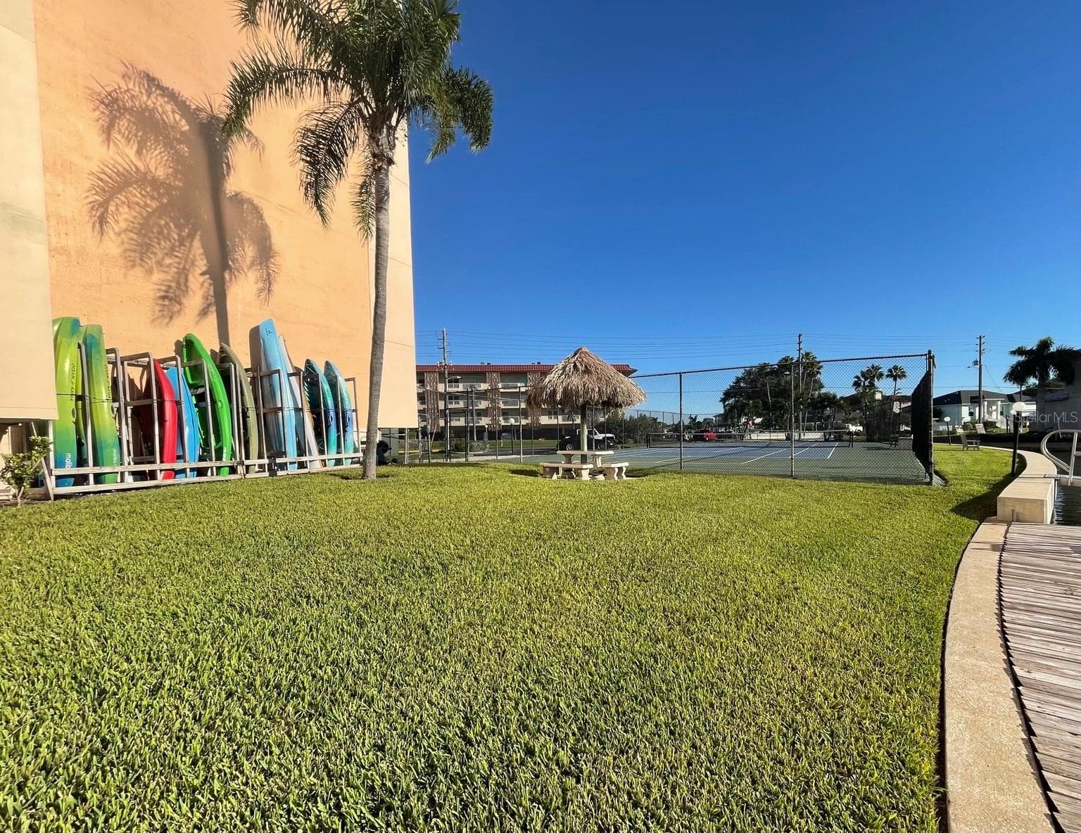 Paddle board and Kayak rack featuring grassy area & Tennis court - 51 ISLAND WAY #1109, CLEARWATER