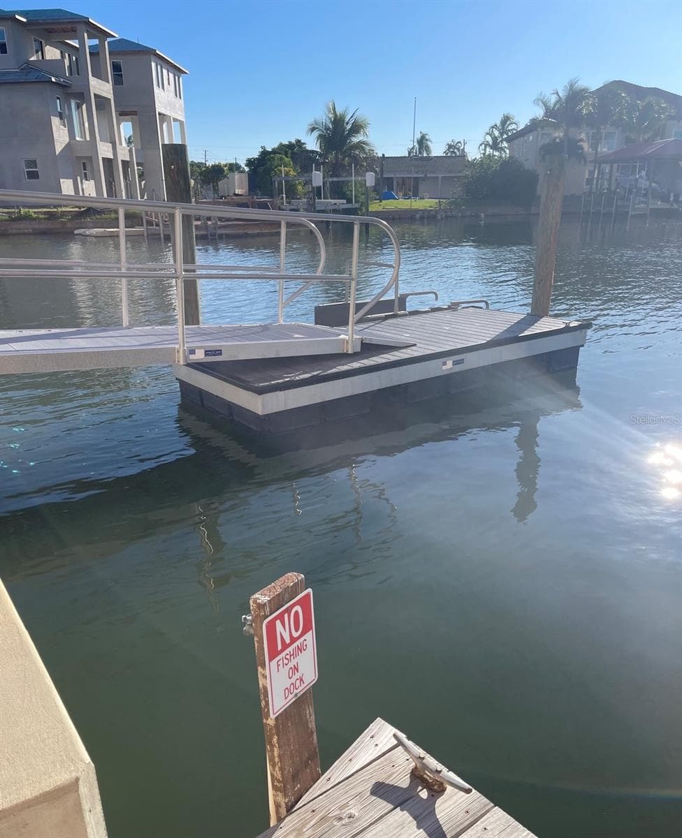 Floating dock with small launch pad for easy in and out of your toys - Fishing only from the seawall, not in the boat dock area - 51 ISLAND WAY #1109, CLEARWATER