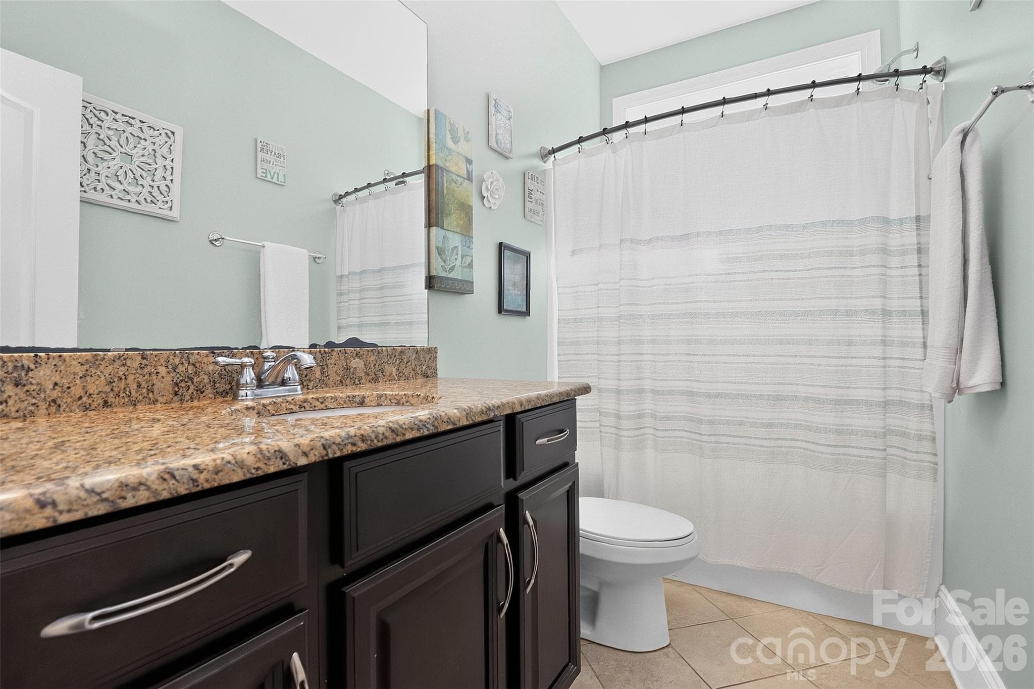 Guest bathroom on main level. - 1550 Millbridge Parkway, Waxhaw
