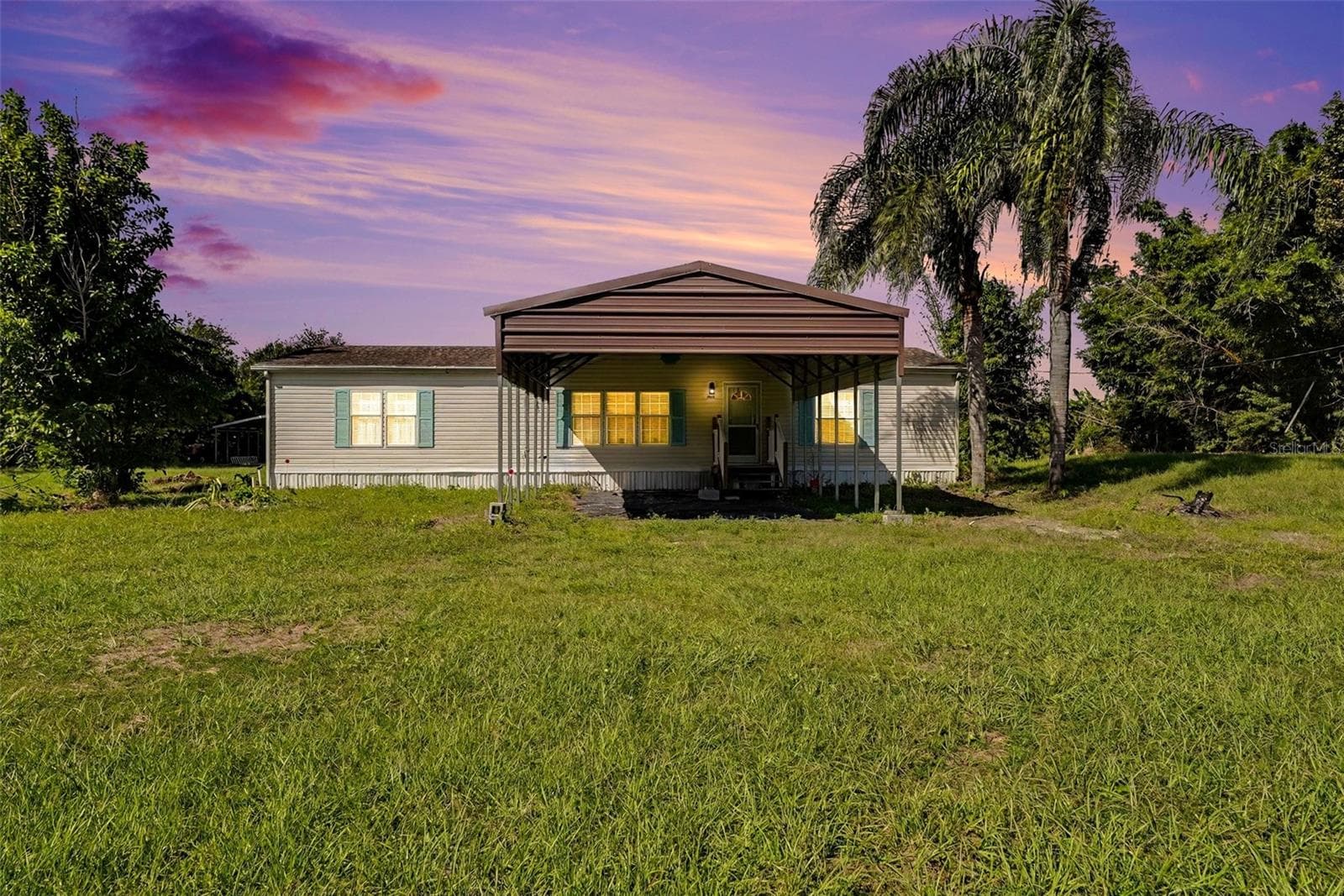 Manufactured Home at 12015 MESSLER RD, GIBSONTON, photo 2 of 37