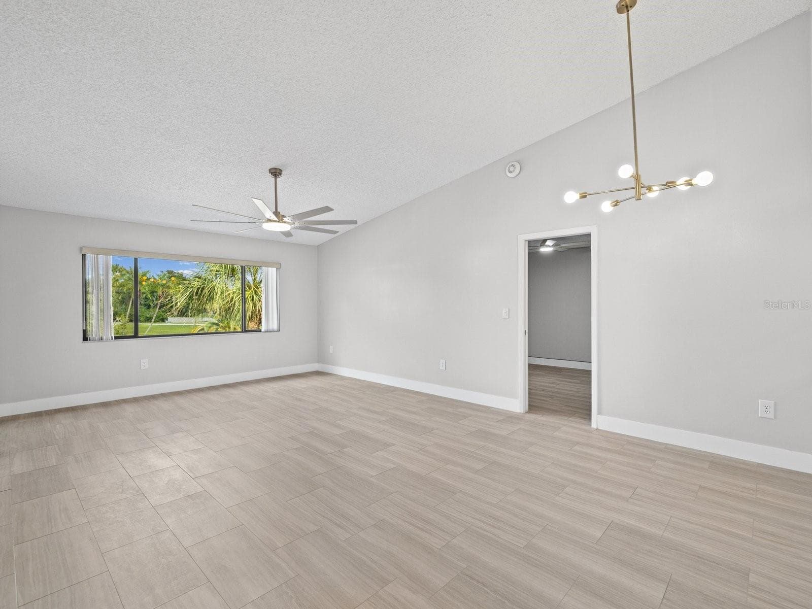 Light and bright living dining with big window - 2593 COUNTRYSIDE BLVD #7304, CLEARWATER