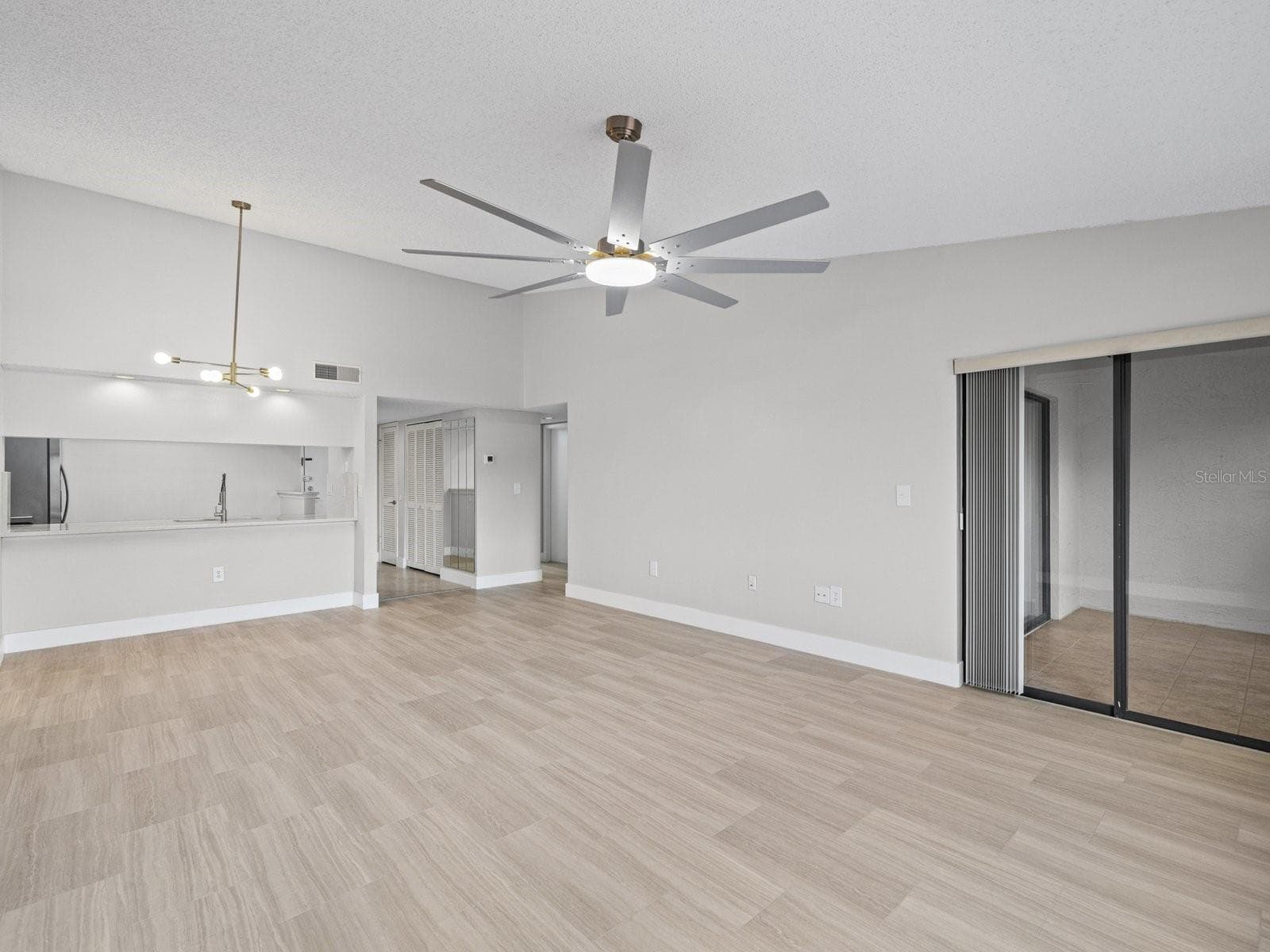 Patio access from living room - 2593 COUNTRYSIDE BLVD #7304, CLEARWATER