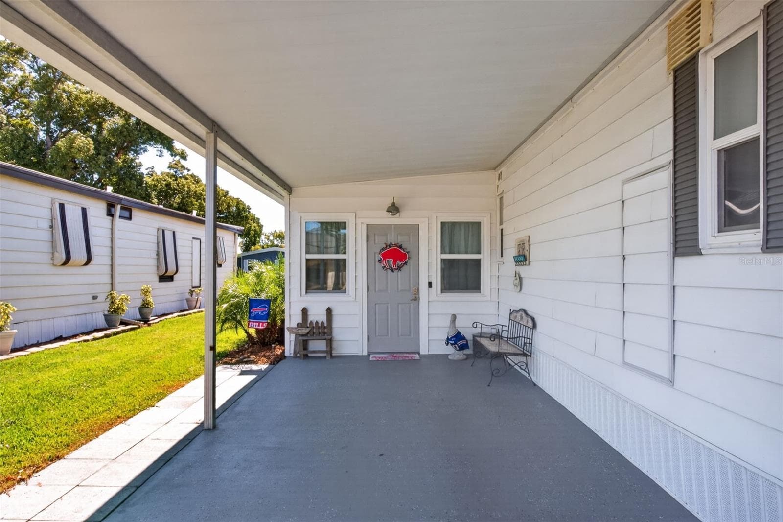 Front entry through car port - 176 CLUBVIEW DR #3, SAFETY HARBOR