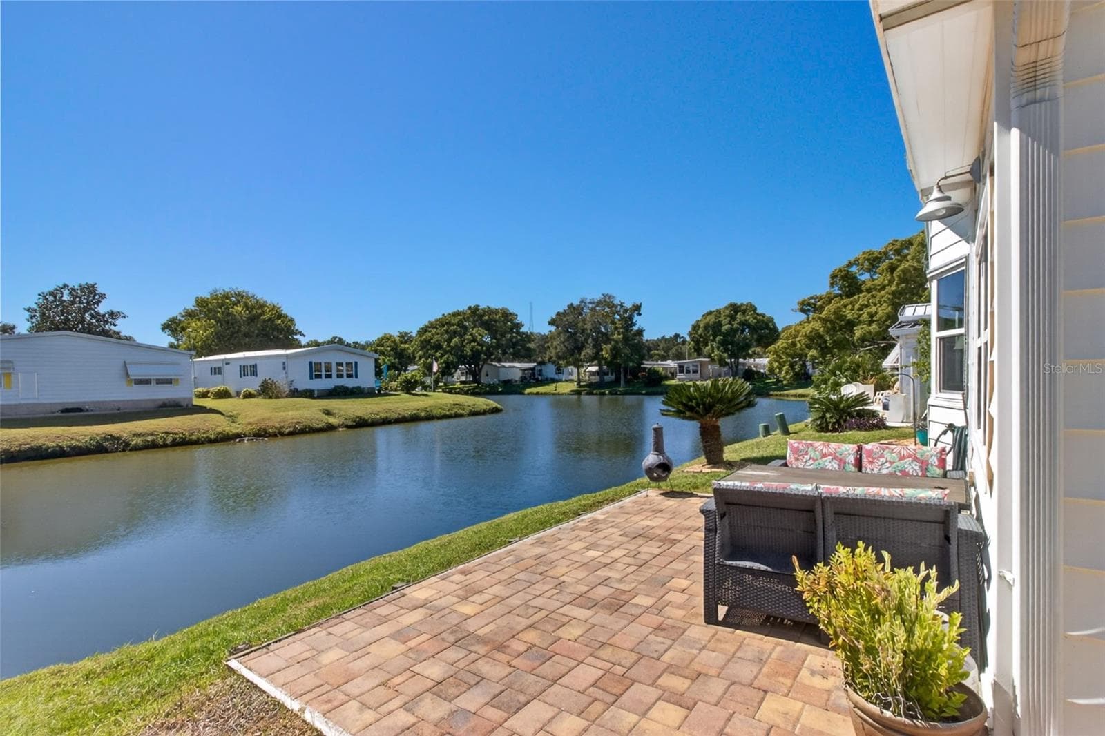 Back patio on Horseshoe Lake - 176 CLUBVIEW DR #3, SAFETY HARBOR