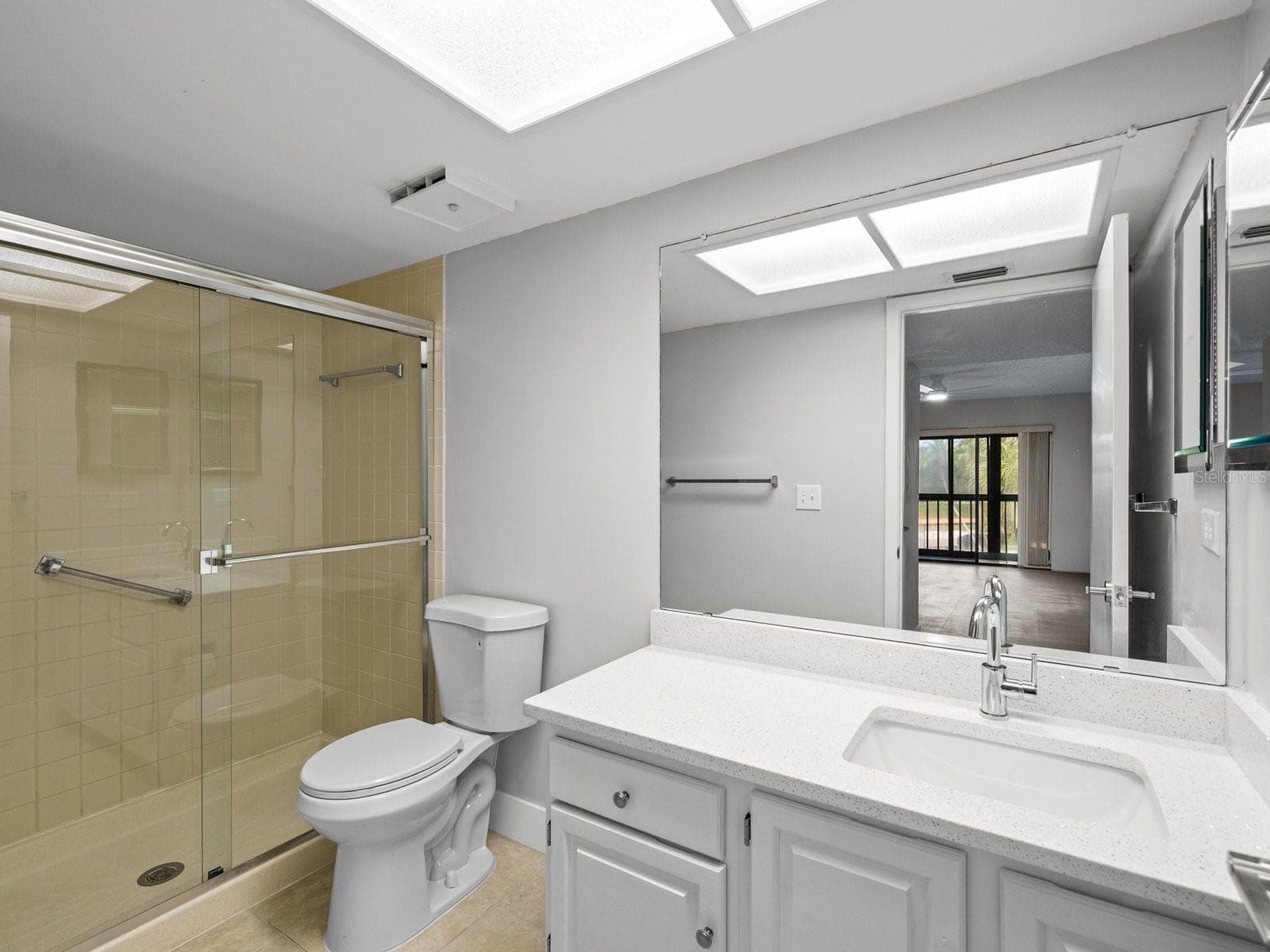 Step in primary shower with glass doors - 2593 COUNTRYSIDE BLVD #7304, CLEARWATER