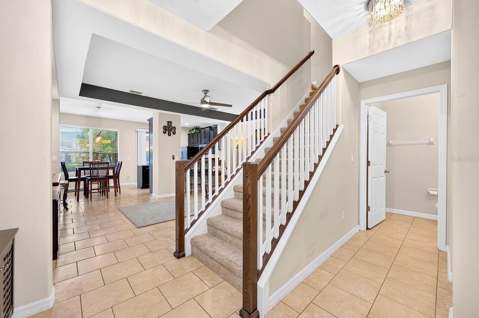 Step inside to a welcoming OPEN FLOOR PLAN where the Living Room, Dining Room and Kitchen flow together. - 2109 VICTORIA GLEN DR, SANFORD