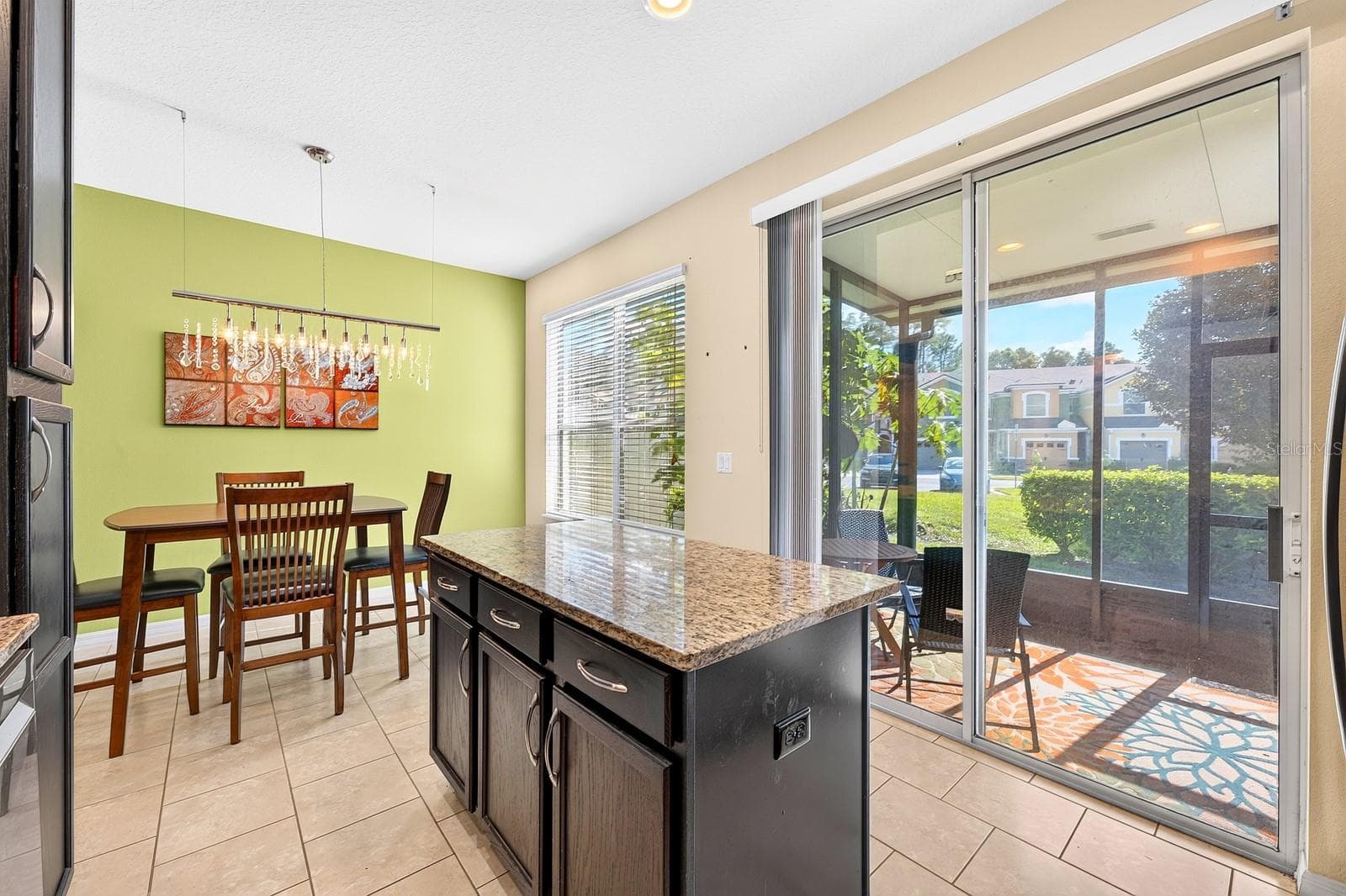 A center island in the Kitchen provides extra prep space. - 2109 VICTORIA GLEN DR, SANFORD