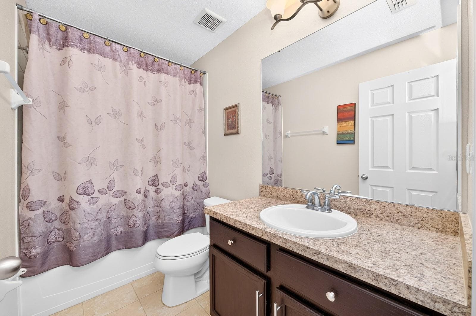 A second full Bath serves the secondary Bedrooms. - 2109 VICTORIA GLEN DR, SANFORD