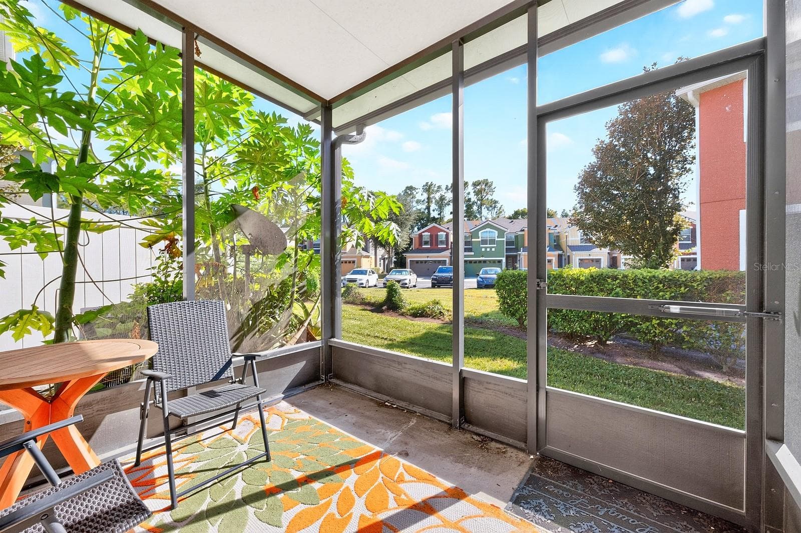 The screened rear porch is a lovely spot to enjoy your morning coffee or unwind at the end of the day. - 2109 VICTORIA GLEN DR, SANFORD