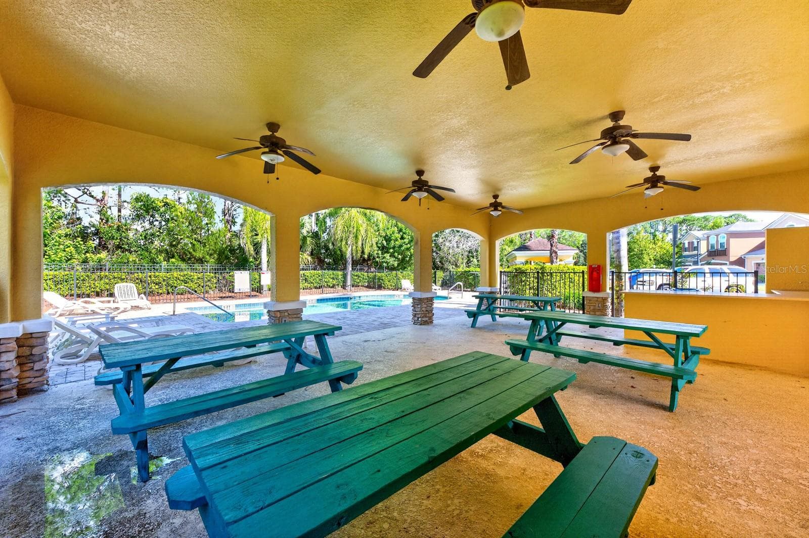 Covered patio with picnic tables near the pool - 2109 VICTORIA GLEN DR, SANFORD