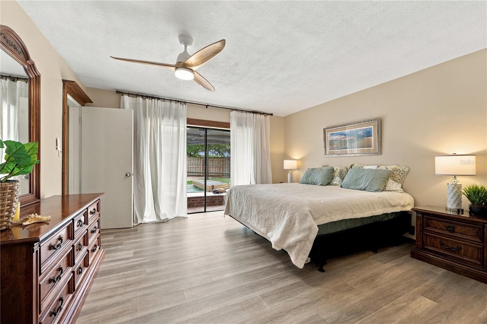 22. Owner's Retreat Features Oversized Sliders to the Lanai.. w a View of the Hot Tub! - 112 PEACOCK CIR, SAFETY HARBOR