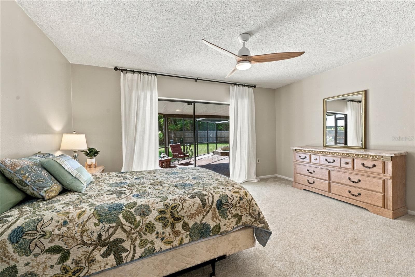 25. Bedroom #2 (11.7 x 15) Features Oversized Sliders to Lanai! - 112 PEACOCK CIR, SAFETY HARBOR