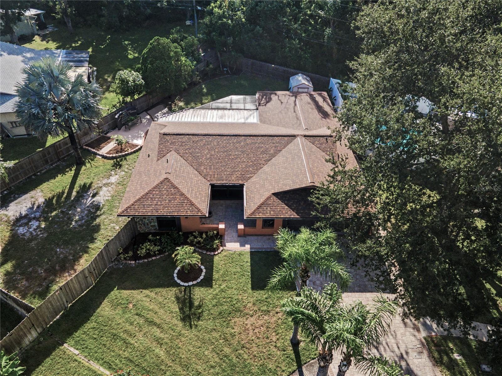 40b. Shade Trees.. Pavers Galore.. Outdoor Living.. 1/4 Acre Lot.. New Roof.. HVAC 2024 .. & So MUCH MORE! - 112 PEACOCK CIR, SAFETY HARBOR