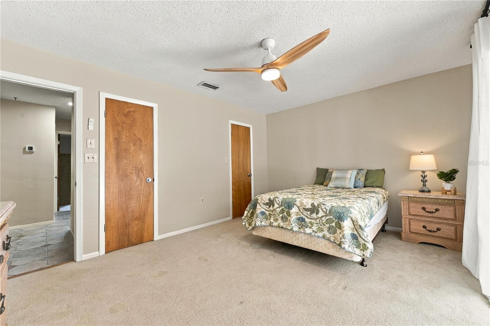 63. Bedroom #2 (11.7 x 15') Offers Walk in Closet (5.3 x 4.3') Again, Just About the Size of Primary Bdrm Closet! - 112 PEACOCK CIR, SAFETY HARBOR