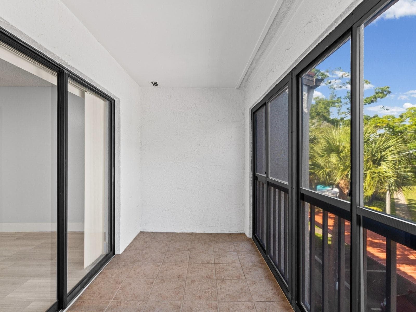 Patio off primary bedroom - 2593 COUNTRYSIDE BLVD #7304, CLEARWATER